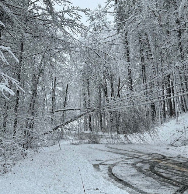 Lineworkers had to work in challenging conditions to restore power.